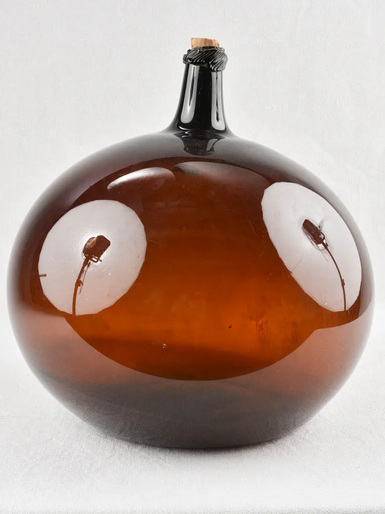 Medium blown glass demijohn - amber 17"